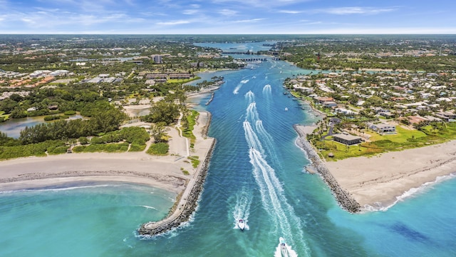 birds eye view of property featuring a view of the beach and a water view