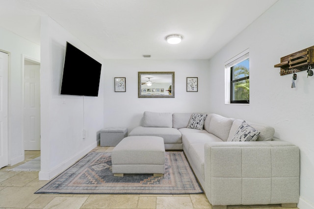 living room with ceiling fan