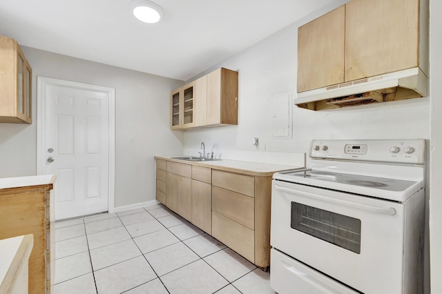 kitchen with sink, light tile patterned floors, white electric stove, and light brown cabinetry