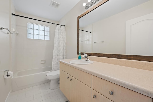 full bathroom with toilet, vanity, shower / bath combo, and tile patterned floors