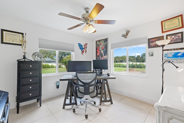 tiled office space with ceiling fan