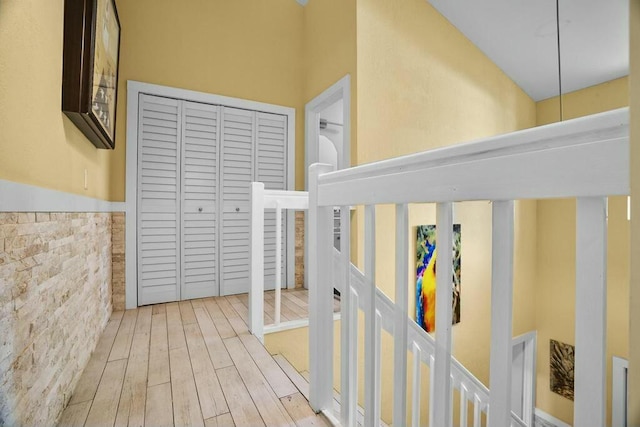 staircase with wood-type flooring