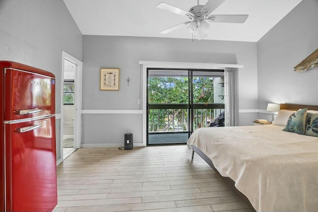 bedroom with ceiling fan, access to outside, fridge, and light hardwood / wood-style floors