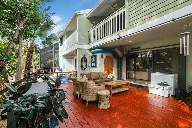 deck with a lanai and outdoor lounge area