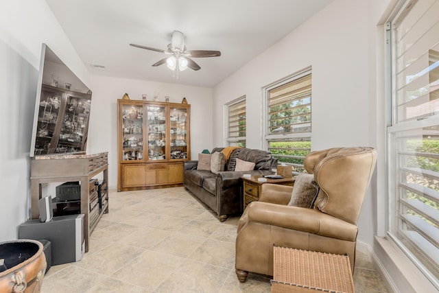 living room featuring ceiling fan