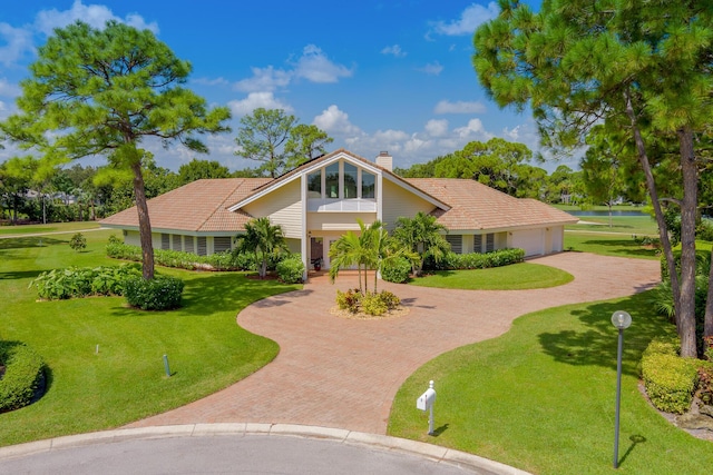 view of front of property with a front lawn