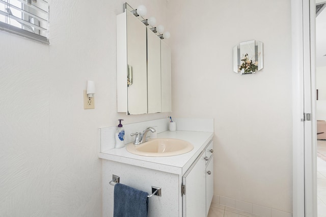 bathroom featuring vanity and tile patterned floors