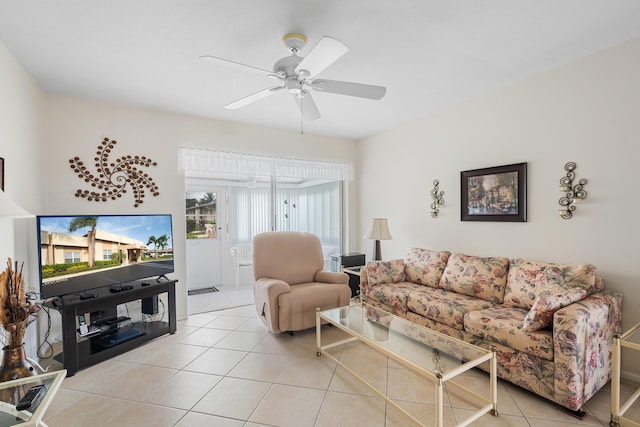 tiled living room featuring ceiling fan