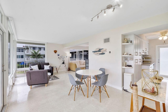 dining area featuring ceiling fan