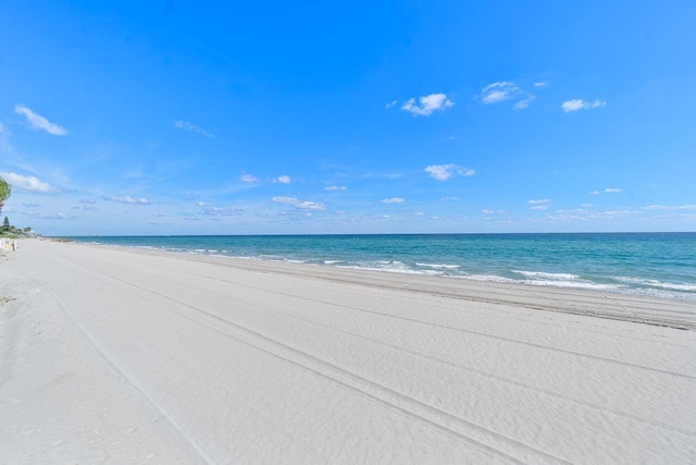 property view of water featuring a beach view