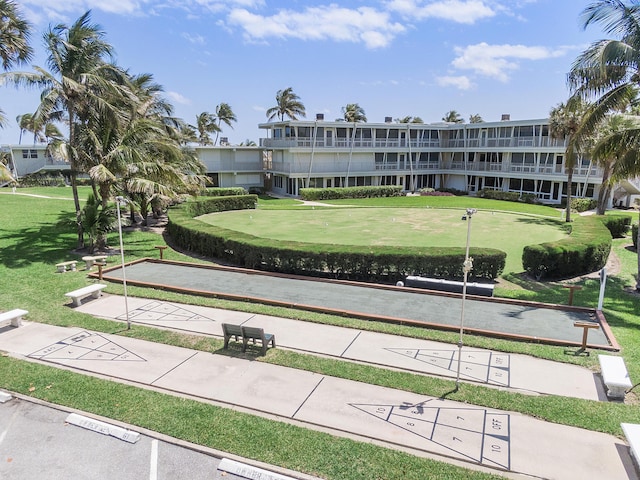 surrounding community featuring a yard