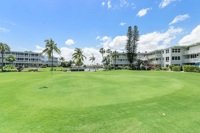 surrounding community featuring a lawn