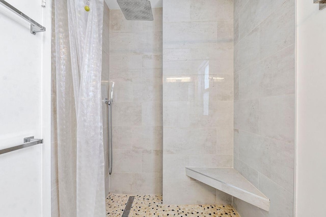 bathroom featuring a shower with curtain