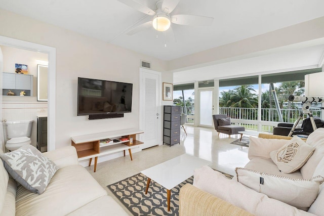 living room featuring ceiling fan