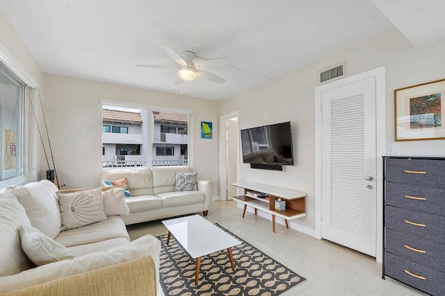 living room with ceiling fan