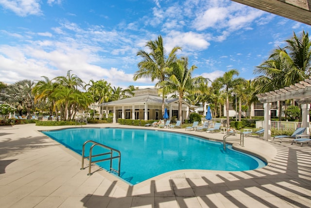 view of swimming pool with a patio area