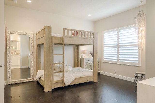 bedroom featuring dark hardwood / wood-style flooring