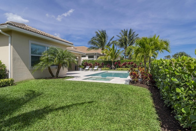 exterior space with a yard and a patio