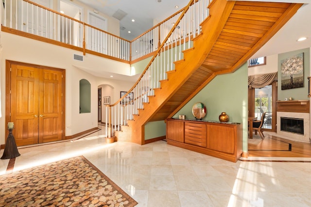 entryway with a high ceiling