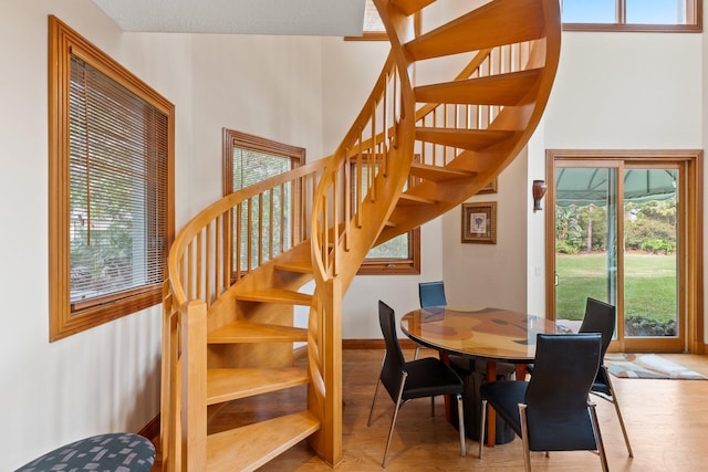 dining area featuring light hardwood / wood-style flooring and a wealth of natural light