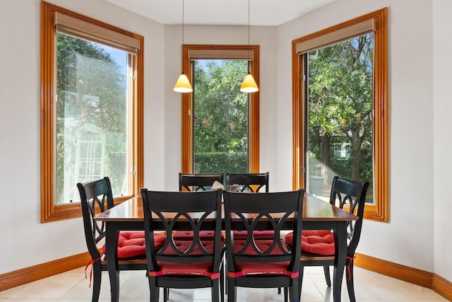 dining space with light tile patterned flooring