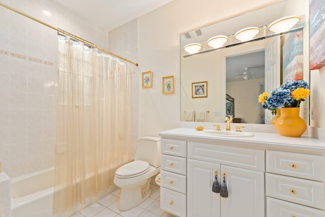 full bathroom featuring vanity, shower / bath combo, tile patterned floors, ceiling fan, and toilet