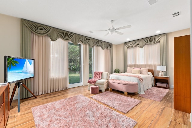 bedroom featuring ceiling fan and wood-type flooring