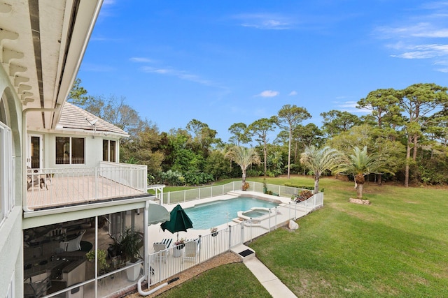 view of swimming pool featuring a lawn