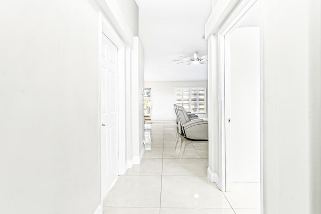 hallway with light tile patterned floors