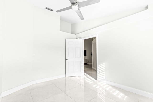 unfurnished room with lofted ceiling and ceiling fan