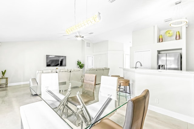 dining room featuring ceiling fan