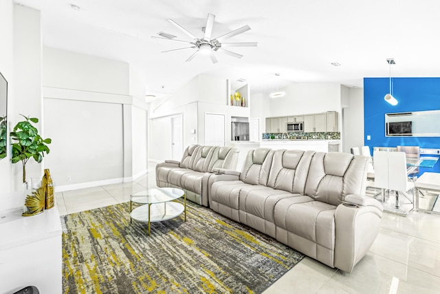 living room featuring high vaulted ceiling, ceiling fan, and light tile patterned floors