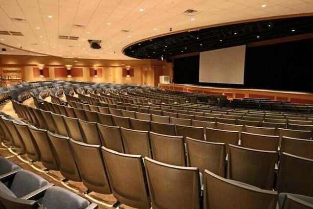 home theater room with wood ceiling