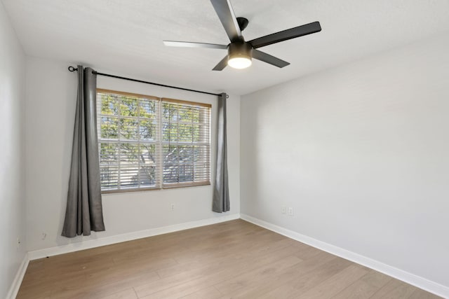 unfurnished room with light hardwood / wood-style floors and ceiling fan