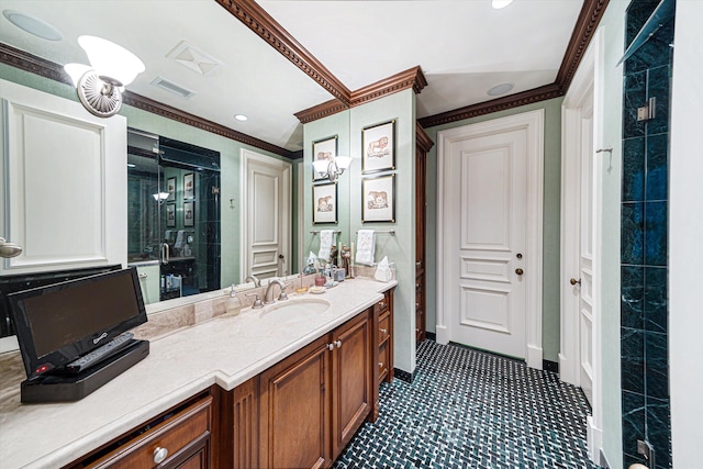 bathroom with vanity, a shower with door, and ornamental molding