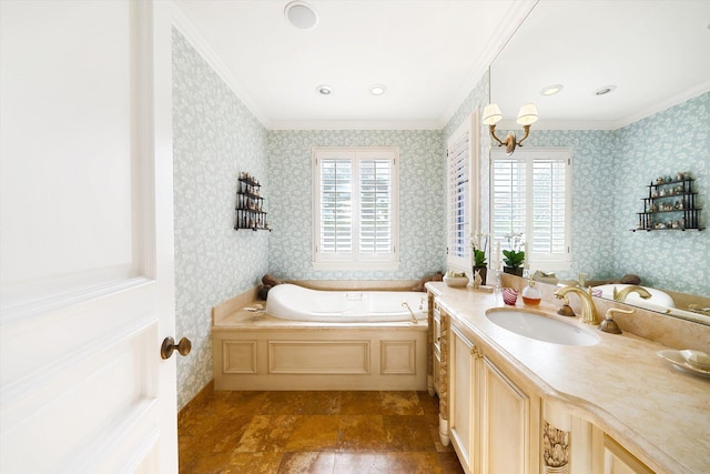 bathroom featuring a washtub, plenty of natural light, and ornamental molding