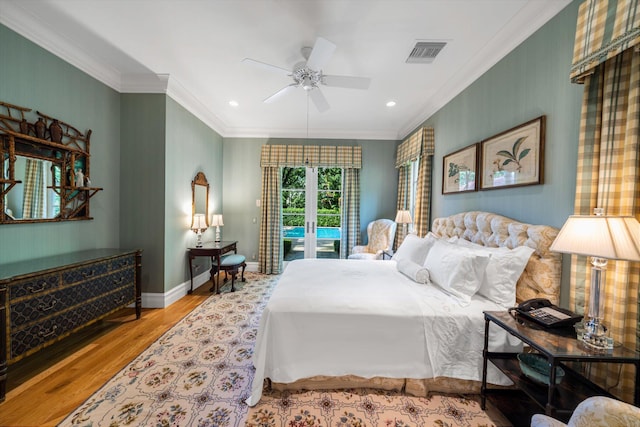 bedroom featuring hardwood / wood-style floors, ceiling fan, crown molding, and access to outside