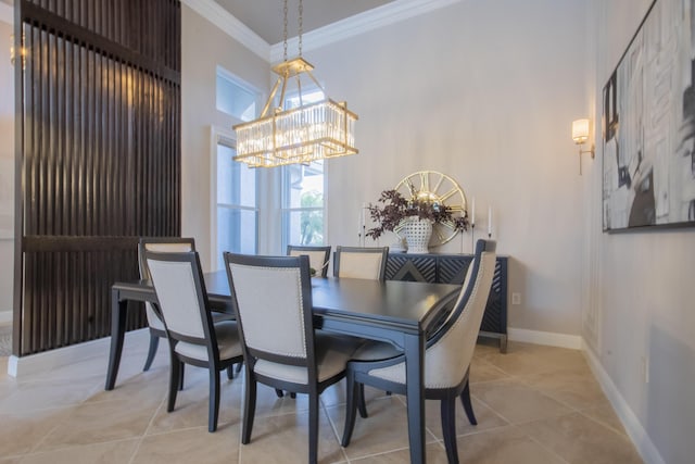 dining room featuring ornamental molding, a notable chandelier, and light tile patterned floors