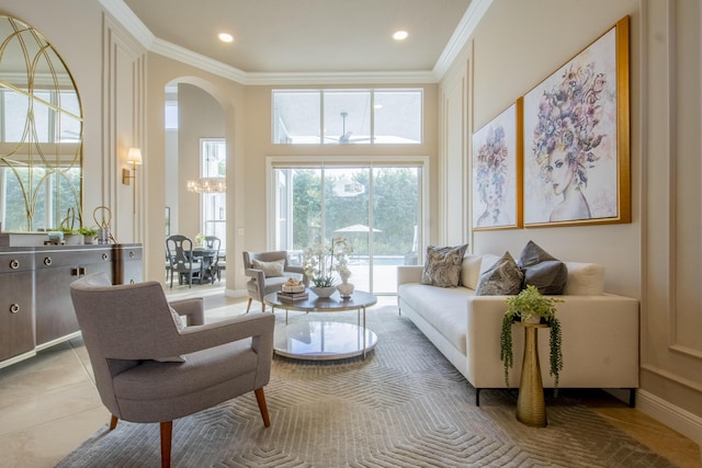 living room with ornamental molding