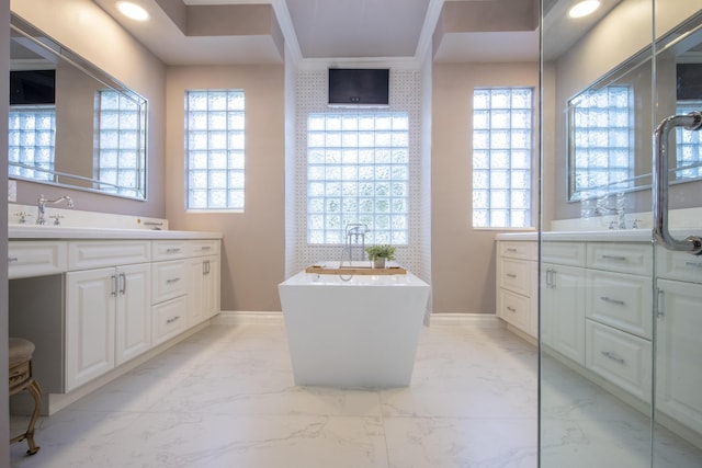 bathroom with a bath, ornamental molding, and vanity