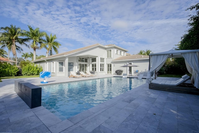 view of pool featuring a patio area