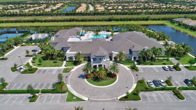 birds eye view of property featuring a water view