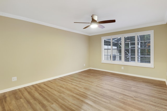 empty room with light hardwood / wood-style flooring, ceiling fan, and ornamental molding