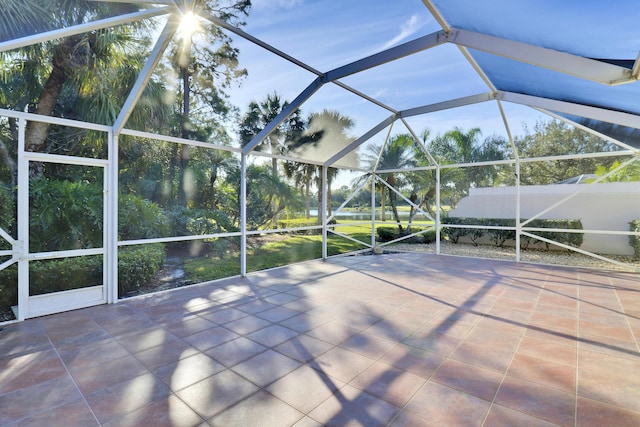 view of patio with a lanai