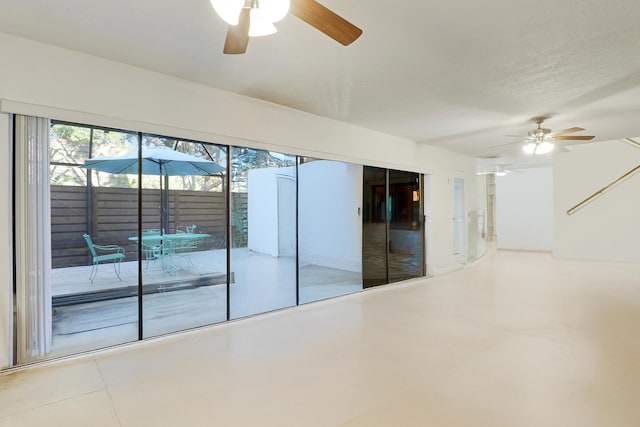 unfurnished room featuring ceiling fan