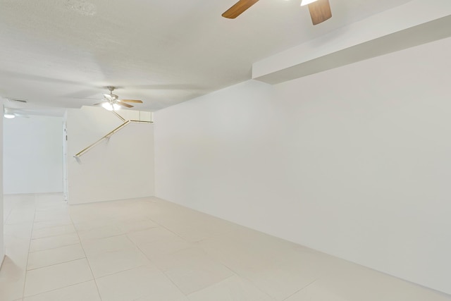 empty room with light tile patterned floors