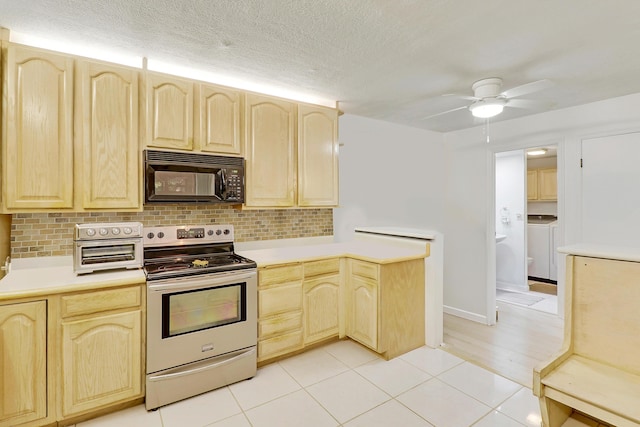 kitchen featuring light tile patterned flooring, light brown cabinets, backsplash, and stainless steel electric range