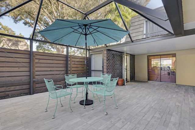 view of patio / terrace with a lanai