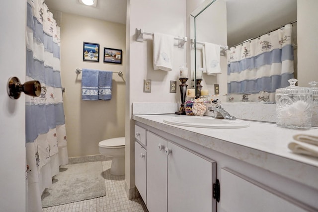 bathroom with baseboards, toilet, curtained shower, tile patterned flooring, and vanity