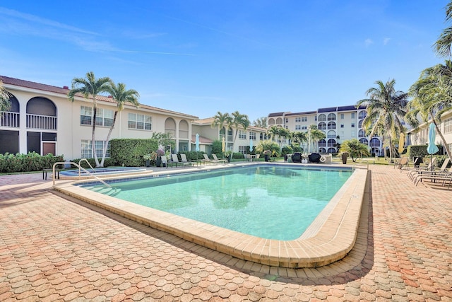 pool with a patio